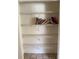 Pantry with wire shelving and books at 64 Inness Dr, Tarpon Springs, FL 34689