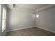 Spacious bedroom with wood-look flooring and neutral walls at 679 Allora Ave, Nokomis, FL 34275