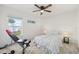 Bedroom with a queen-size bed and home gym equipment at 1300 Cedar Ct, Tarpon Springs, FL 34689