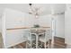 Small dining area with table and four chairs, perfect for everyday meals at 1300 Cedar Ct, Tarpon Springs, FL 34689
