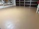 Newly finished tan epoxy garage floor at 1300 Cedar Ct, Tarpon Springs, FL 34689