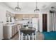 Cozy kitchen with dining area and appliances at 1300 Cedar Ct, Tarpon Springs, FL 34689