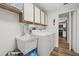 Laundry room with washer, dryer, and sink at 1300 Cedar Ct, Tarpon Springs, FL 34689
