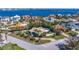 Aerial view showcasing a waterfront home and neighborhood at 165 4Th N Ave, Tierra Verde, FL 33715