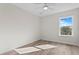 Light and airy bedroom with hardwood floors and a ceiling fan at 208 W Frances Ave # 2, Tampa, FL 33602