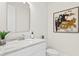 Modern bathroom with white cabinets and marble countertop at 208 W Frances Ave # 3, Tampa, FL 33602