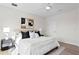 King-size bed in a well-lit bedroom with modern decor at 208 W Frances Ave # 3, Tampa, FL 33602