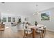 Open concept dining room and living area with hardwood floors at 208 W Frances Ave # 3, Tampa, FL 33602