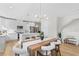 Modern kitchen with white cabinets, stainless steel appliances, and an island at 208 W Frances Ave # 3, Tampa, FL 33602