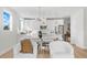 Modern kitchen with white cabinets and island at 208 W Frances Ave # 3, Tampa, FL 33602