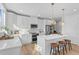 Modern kitchen with white cabinets, stainless steel appliances, and an island at 208 W Frances Ave # 3, Tampa, FL 33602