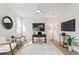Spacious home office with hardwood floors, large artwork, and comfortable seating at 208 W Frances Ave # 3, Tampa, FL 33602