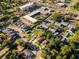 Aerial view of home near a busy intersection at 8721 N River Forest Cir, Tampa, FL 33604