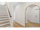 Modern staircase with white risers and dark wood treads, leading to the second floor at 208 W Frances Ave # 5, Tampa, FL 33602