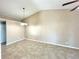 Neutral dining room featuring tile floors and modern chandelier-style lighting at 2288 Citrus Ct, Clearwater, FL 33763