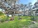 Enjoy a peaceful afternoon with the community picnic tables and the shade from the mature trees at 2288 Citrus Ct, Clearwater, FL 33763