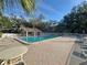 Community pool offers a refreshing retreat with ample seating and scenic views at 2288 Citrus Ct, Clearwater, FL 33763