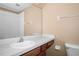 Bathroom with wood vanity and a single sink at 4517 Kennewick Pl, Riverview, FL 33578