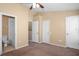 Bedroom with en-suite bathroom and ample closet space at 4517 Kennewick Pl, Riverview, FL 33578