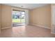 Bright Gathering room with sliding glass doors to patio at 4517 Kennewick Pl, Riverview, FL 33578