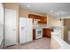 White appliances and wood cabinets in this kitchen at 4517 Kennewick Pl, Riverview, FL 33578