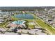 Community features a lake, pool, and pickleball courts at 9917 Spanish Lime Ct, Riverview, FL 33578