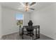 Bedroom with a desk and chair, perfect for a home office at 9917 Spanish Lime Ct, Riverview, FL 33578