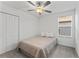 Comfortable bedroom with a double bed and plenty of closet space at 9917 Spanish Lime Ct, Riverview, FL 33578