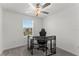 Cozy bedroom with a desk, chair, and plenty of natural light at 9917 Spanish Lime Ct, Riverview, FL 33578