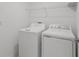 Convenient laundry room with washer and dryer at 9917 Spanish Lime Ct, Riverview, FL 33578