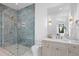 Bright bathroom featuring a shower, vanity, and designer finishes at 105 Cordova Ne Blvd, St Petersburg, FL 33704