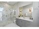 Elegant bathroom featuring a luxurious shower with marble tile, sleek vanity, and contemporary fixtures at 105 Cordova Ne Blvd, St Petersburg, FL 33704