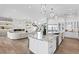 Well-appointed kitchen features a marble island, stainless steel appliances, and seamless living space at 105 Cordova Ne Blvd, St Petersburg, FL 33704