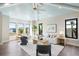 Bright living room with wood floors, blue ceiling, and stylish furniture at 105 Cordova Ne Blvd, St Petersburg, FL 33704