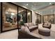 Serene outdoor seating area with comfortable furnishings and seamless transition to the luxurious interior spaces at 105 Cordova Ne Blvd, St Petersburg, FL 33704