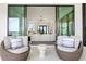 Covered patio with plush seating overlooking the interior and exterior of the property at 105 Cordova Ne Blvd, St Petersburg, FL 33704