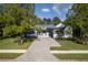 Modern farmhouse exterior with a welcoming front porch at 4586 Hickory Oak Dr, Brooksville, FL 34601