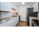 Modern kitchen with stainless steel appliances and granite counters at 3455 Countryside Blvd # 52, Clearwater, FL 33761
