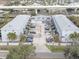 Aerial view of community pool and building at 4883 W Mcelroy Ave # G211, Tampa, FL 33611