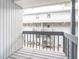 Private balcony overlooking courtyard at 4883 W Mcelroy Ave # G211, Tampa, FL 33611