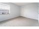 Simple bedroom with carpet floors and closet at 4883 W Mcelroy Ave # G211, Tampa, FL 33611