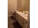 Bathroom with mirror and an undermount sink at 5143 Vassar Ln, Sarasota, FL 34243