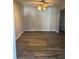 Living room with natural light and wood-look flooring at 5143 Vassar Ln, Sarasota, FL 34243