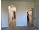 Bedroom with access to bathroom and hallway at 8219 Caponata Blvd, Seminole, FL 33777