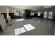 Open living area with tile floors and fireplace, ready for renovation at 4518 Helena Ne St, St Petersburg, FL 33703