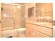 Clean bathroom with tub shower and granite vanity at 117 114Th N Ave # 117, St Petersburg, FL 33716