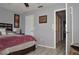 Main bedroom with grey walls and wood flooring at 117 114Th N Ave # 117, St Petersburg, FL 33716