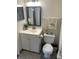 Bathroom features a vanity with storage and decorative flamingo at 2690 Coral Landings Blvd # 722, Palm Harbor, FL 34684