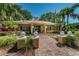 Inviting clubhouse entrance surrounded by lush landscaping at 2690 Coral Landings Blvd # 722, Palm Harbor, FL 34684