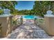Stairway leads to the community pool with ample lounge chairs at 2690 Coral Landings Blvd # 722, Palm Harbor, FL 34684